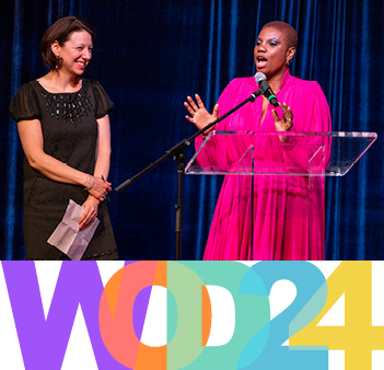 2024 Women of Distinction Awards - two women on stage with microphone